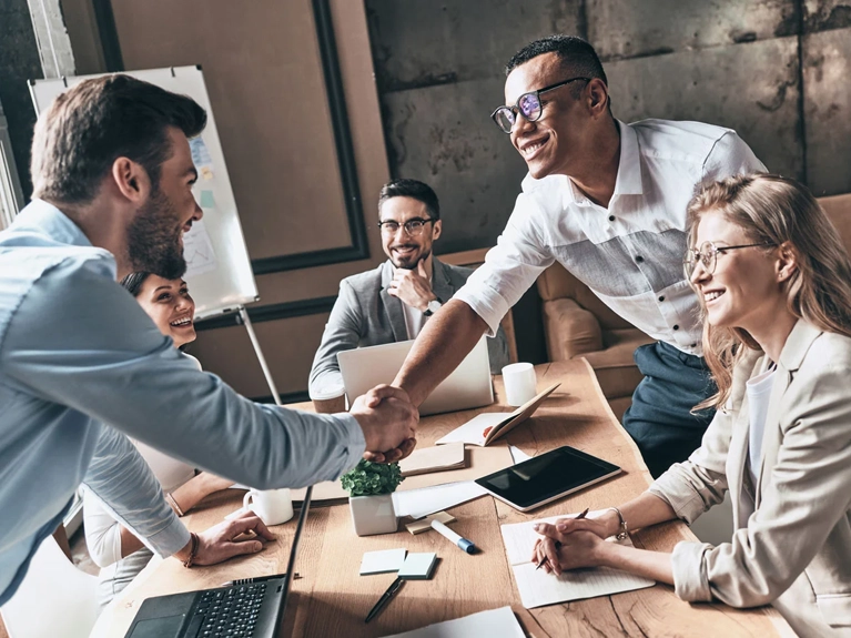 PR business people shaking hands and speaking 
