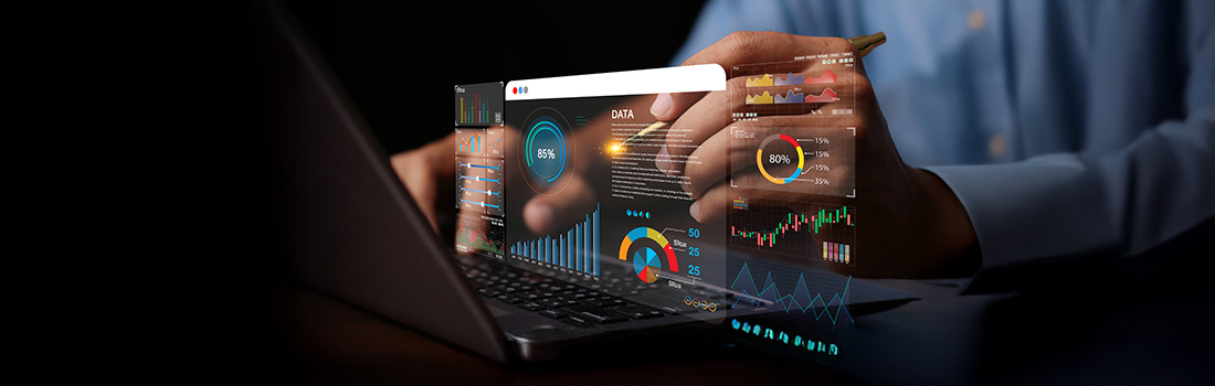 Lawyer using legal metrics at desk, pointing to data appearing virtually from laptop